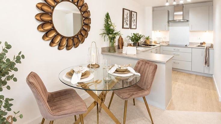 a dining room table with chairs