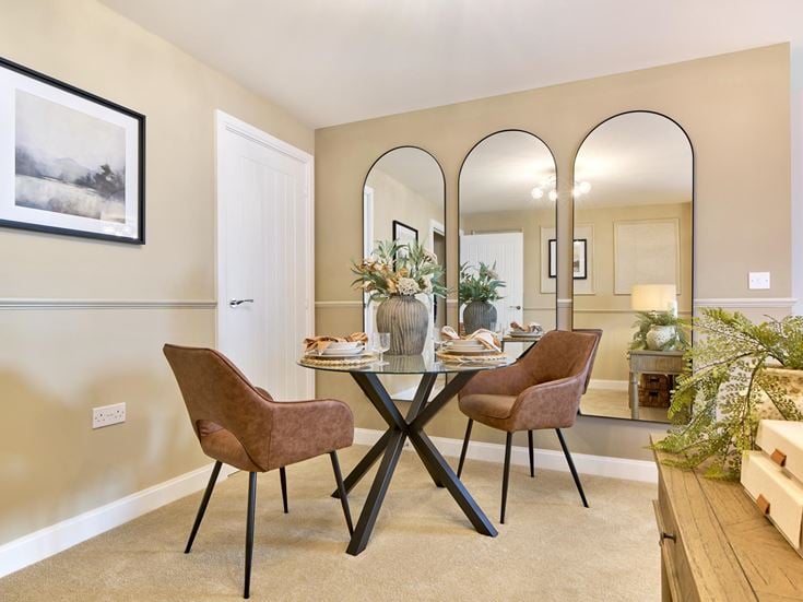 a dining room table with chairs