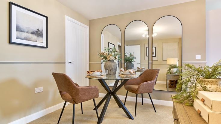a dining room table with chairs