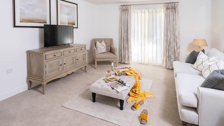 a living room with a couch and a coffee table