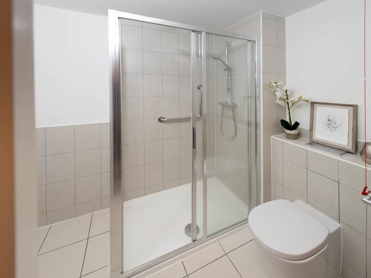 a shower with a glass door