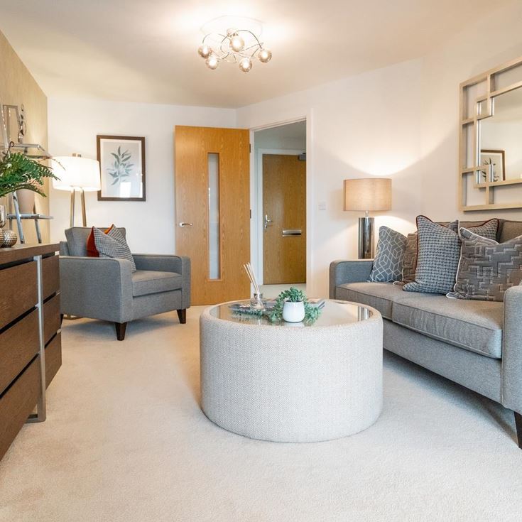 a living room with a couch and a coffee table