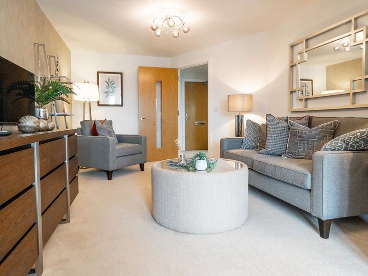 a living room with a couch and a coffee table