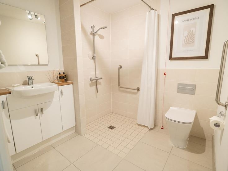 a bathroom with a standup shower