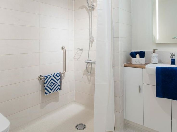 a bathroom with a bathtub and sink