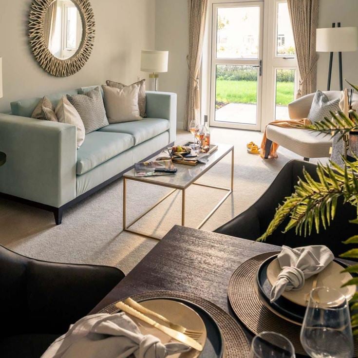 a living room with a couch and a coffee table