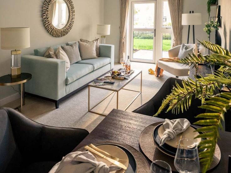 a living room with a couch and a coffee table