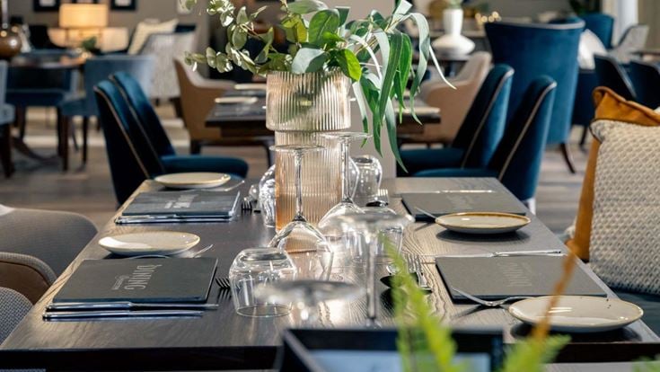 a table with empty glasses