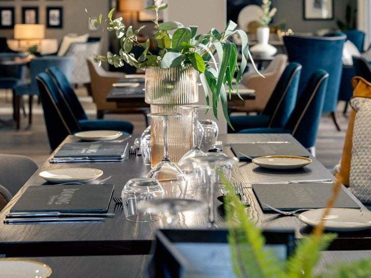 a table with empty glasses