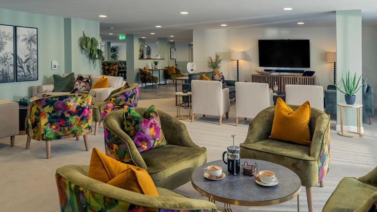 a living room with a couch and a television