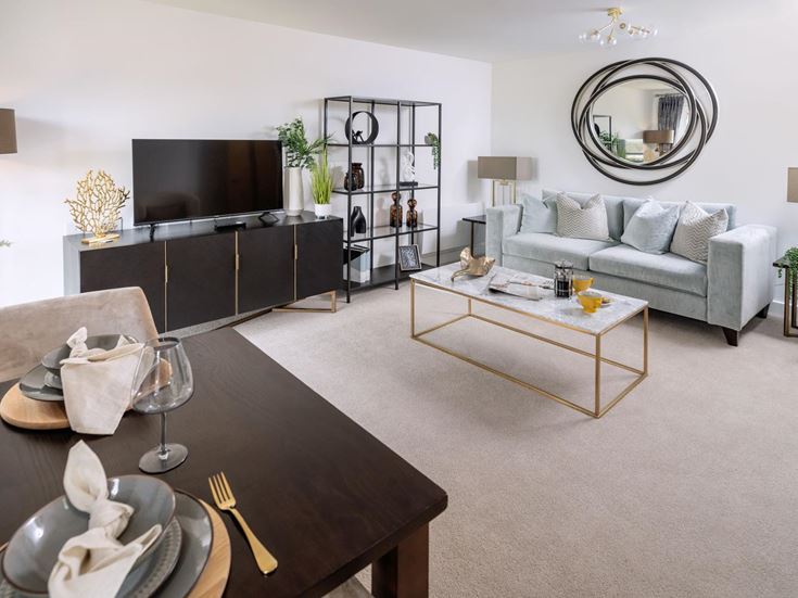 a living room with a large mirror