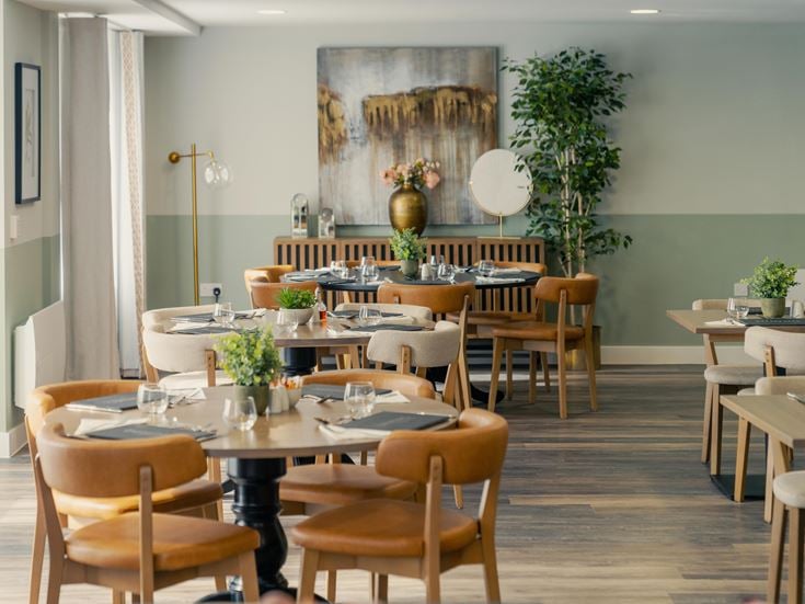 a room with tables and chairs
