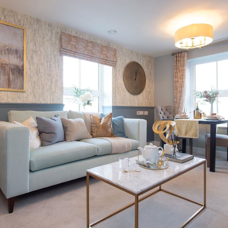 a living room with a couch and a coffee table