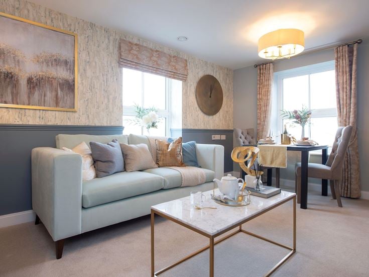 a living room with a couch and a coffee table