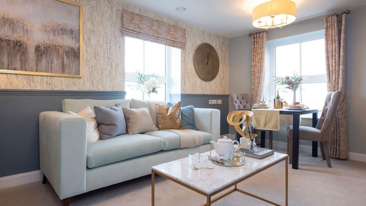 a living room with a couch and a coffee table