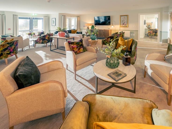 a living room with a large couch