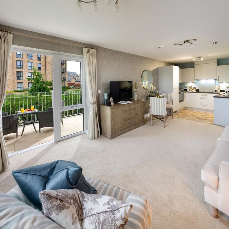 a living room with a large glass door