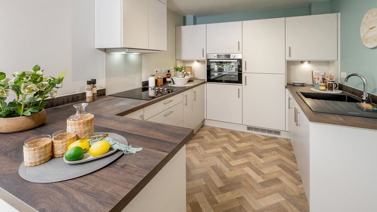 a kitchen with a marble counter top