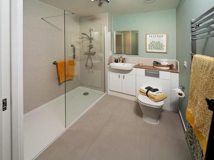 a bathroom with a glass shower