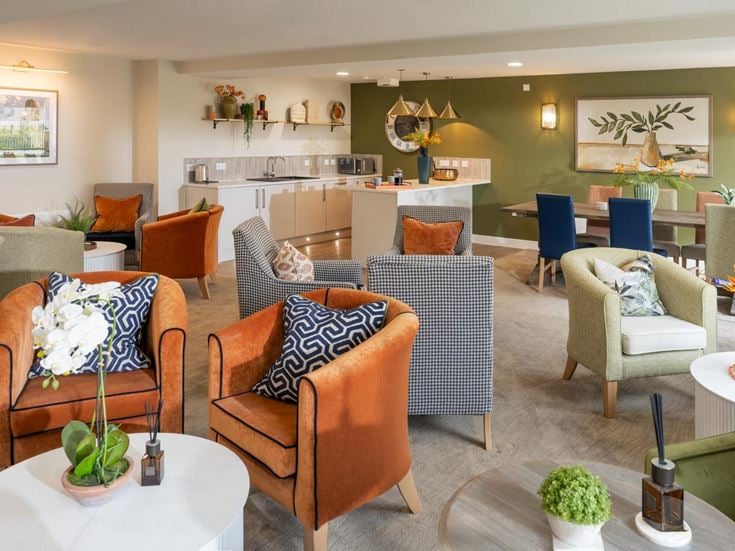 a room with chairs and tables