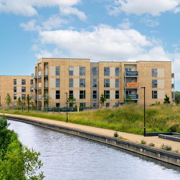 a building with a river running through it