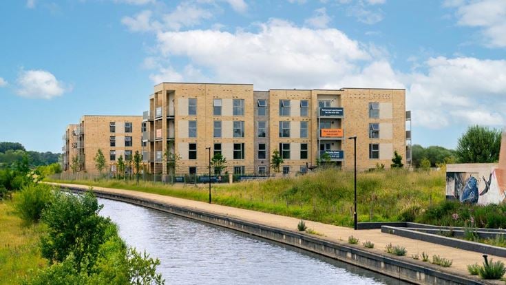 a building with a river running through it