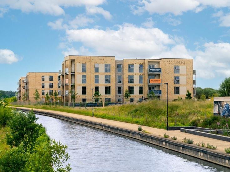 a building with a river running through it