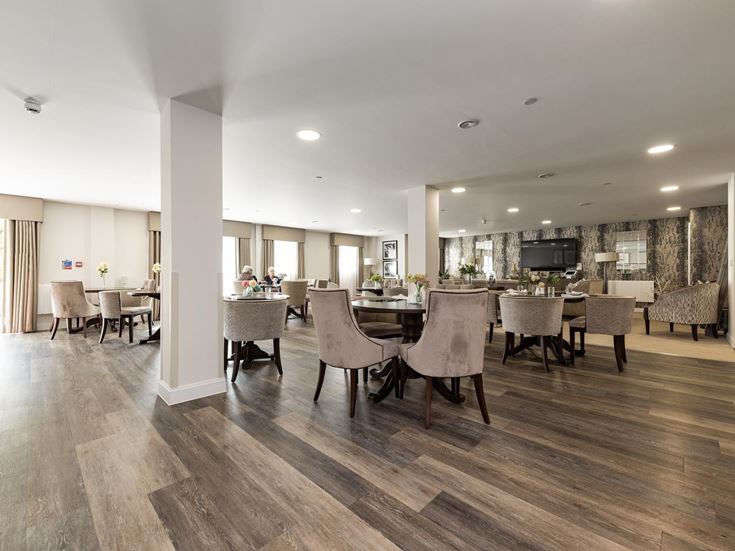 a large room with tables and chairs