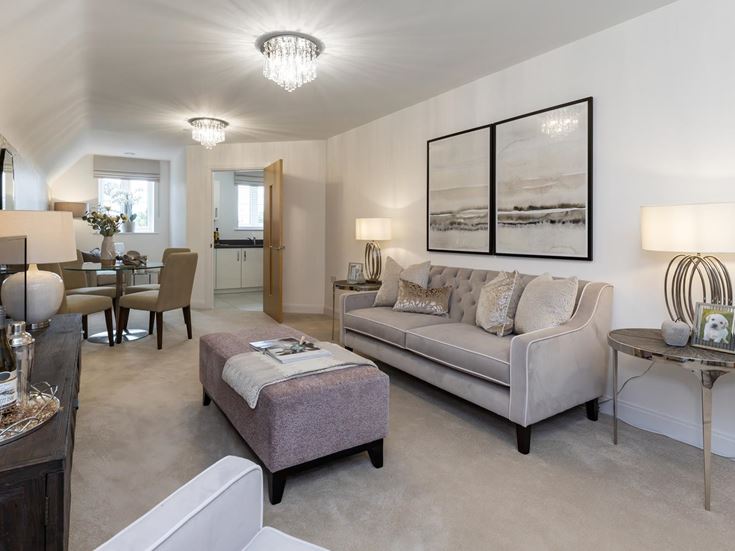 a living room with a couch and a table
