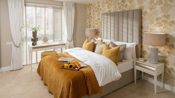 a bedroom with a bed and a table