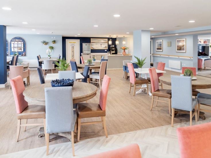 a room with tables and chairs