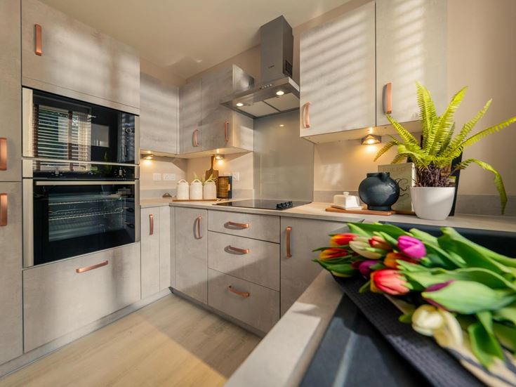 a kitchen with stainless steel appliances