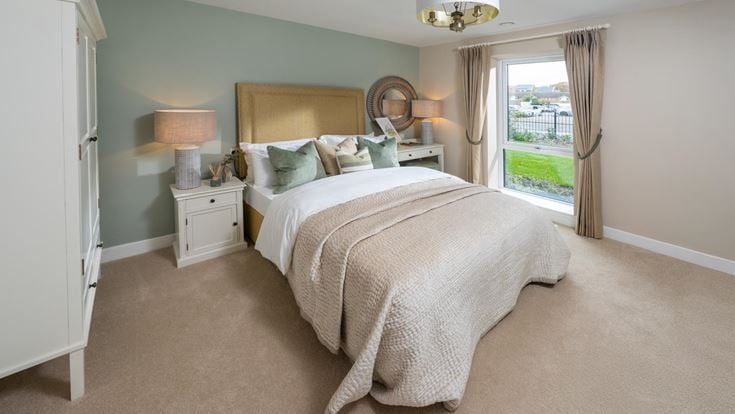 a bedroom with a large bed