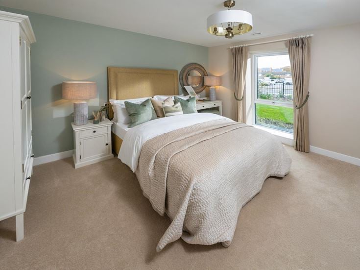 a bedroom with a large bed
