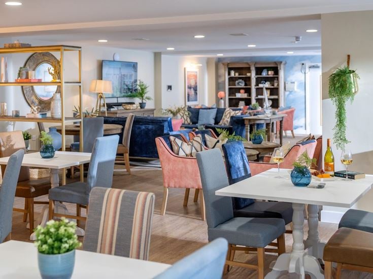 a room with tables and chairs