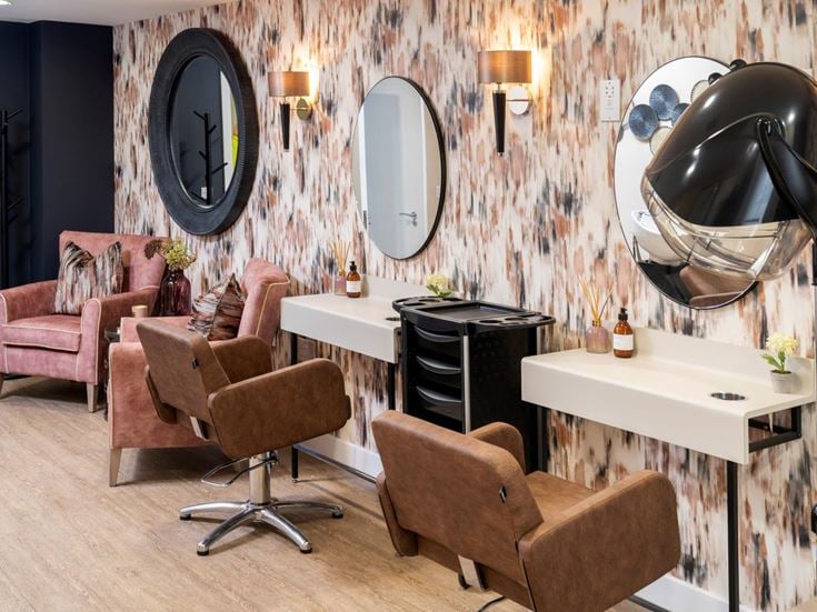 a room with a table and chairs