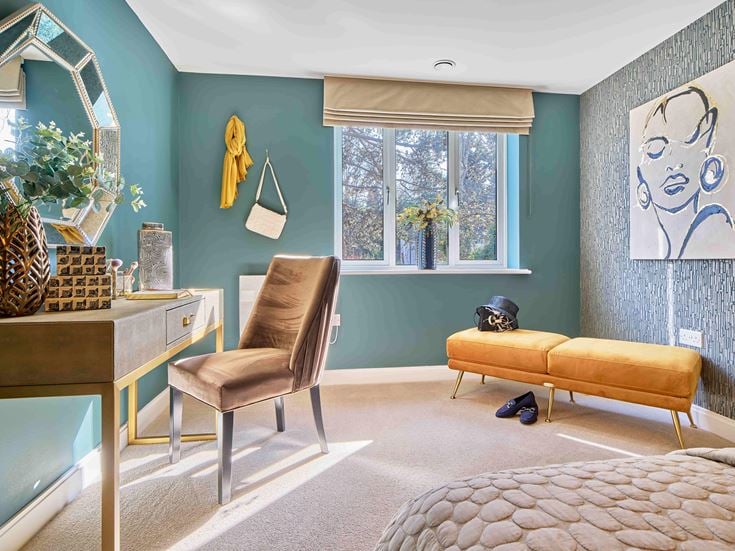 a living room with a couch and a table