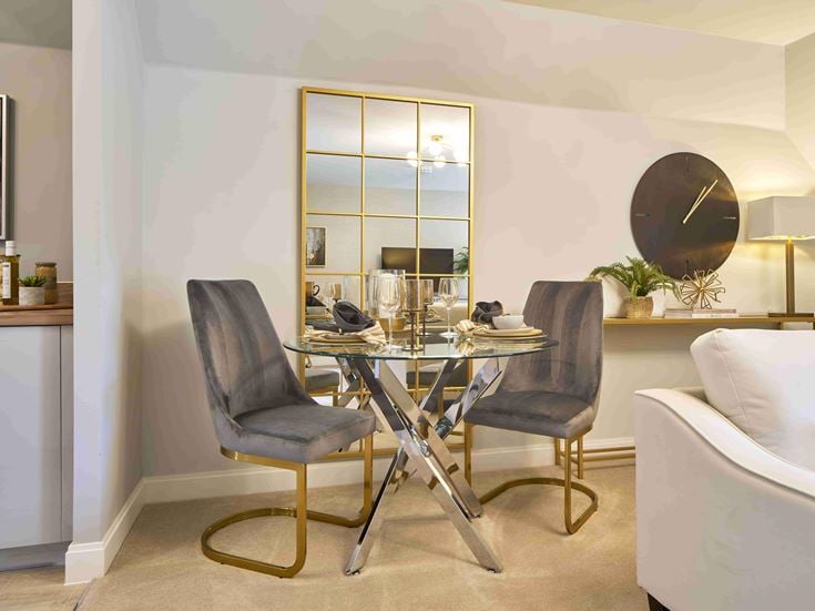 a room with a table and chairs