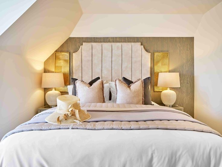 a bed with a large headboard