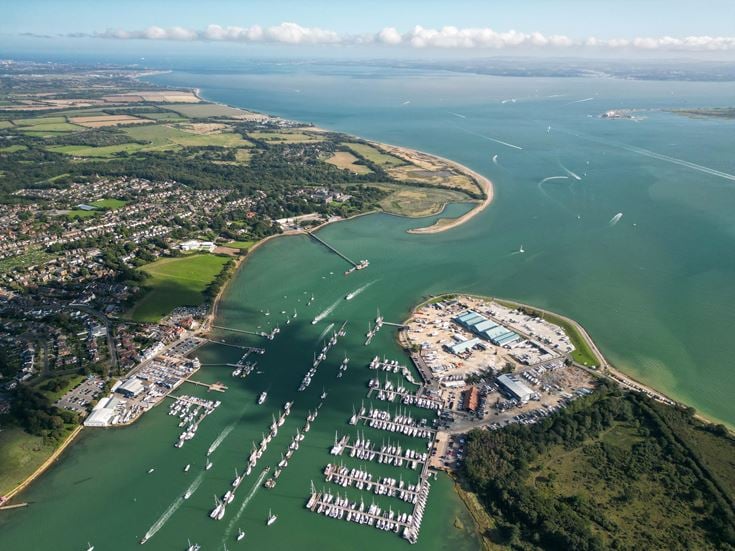 a river with a city in the background