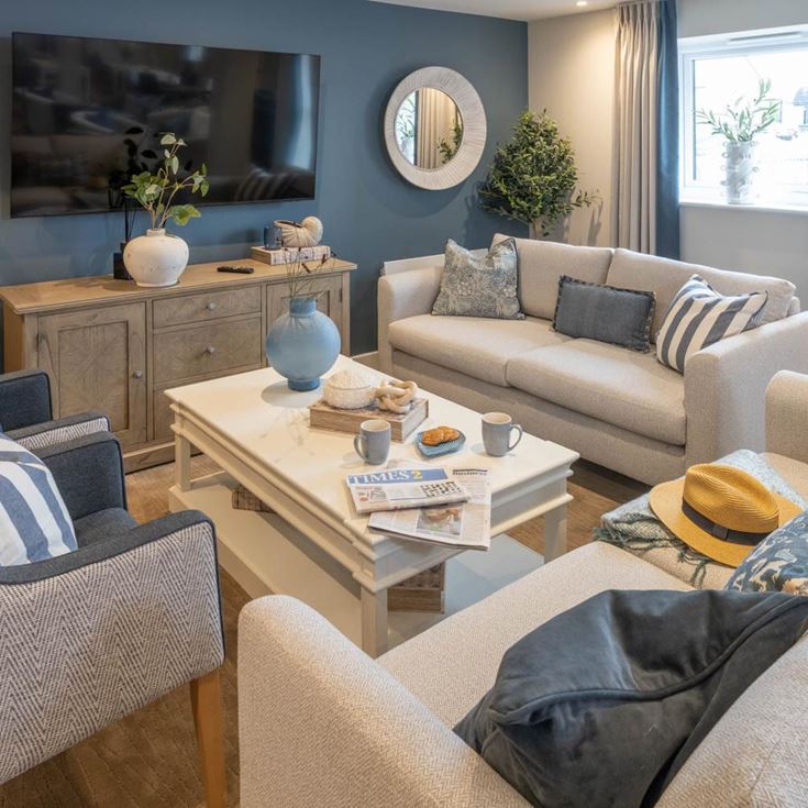 a living room with a couch and a coffee table
