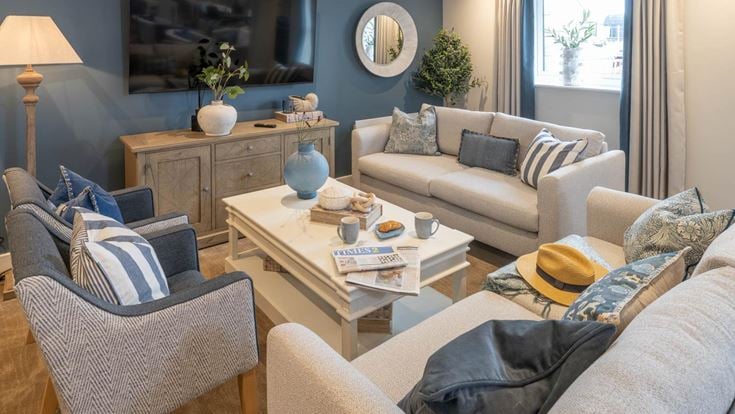 a living room with a couch and a coffee table