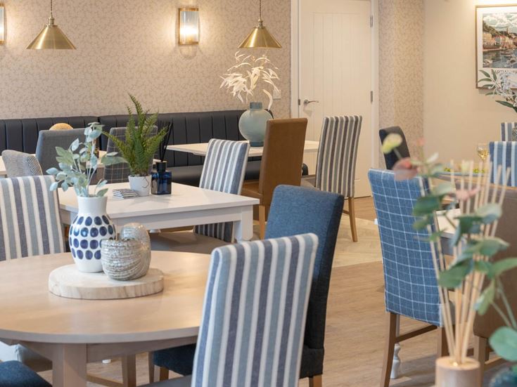 a room with tables and chairs