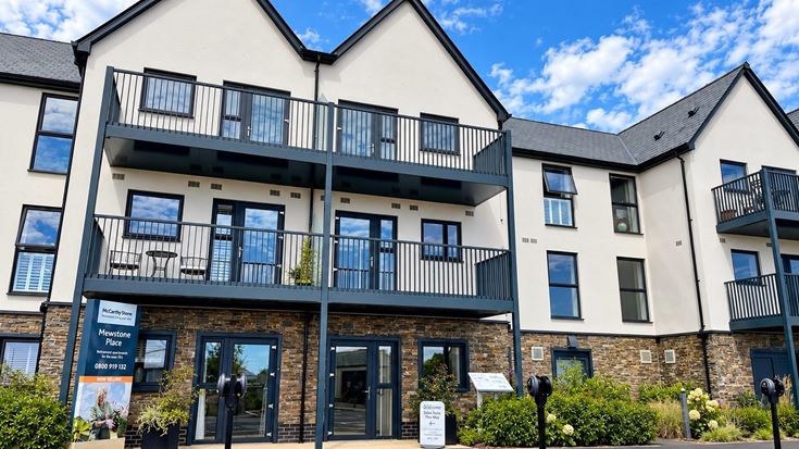 a building with a street in front