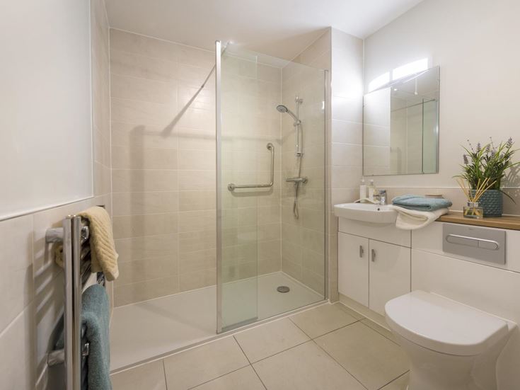 a bathroom with a glass shower
