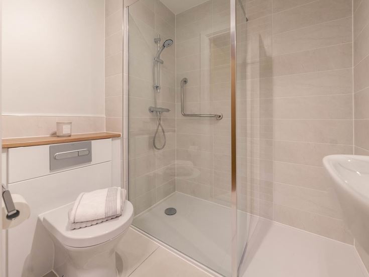 a bathroom with a glass shower
