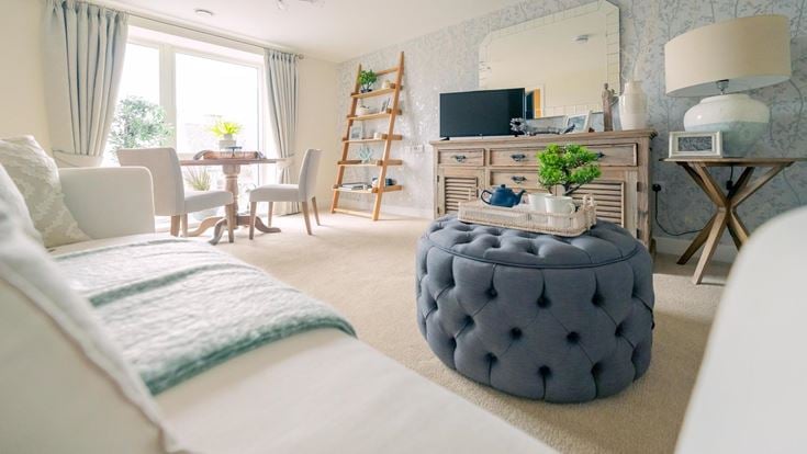 a bedroom with a bed and a fireplace