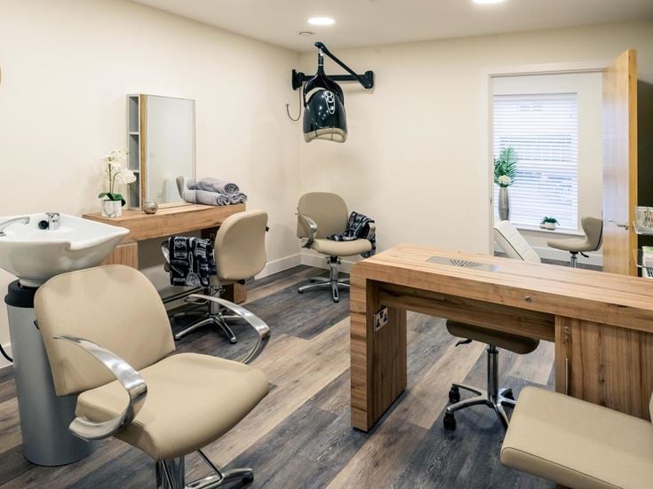 a room with a table and chairs
