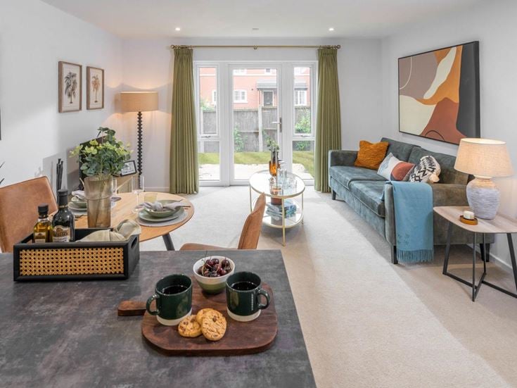 a living room with a couch and coffee table