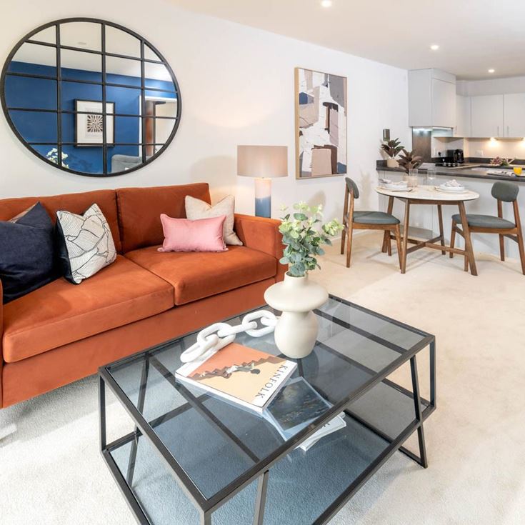a living room with a couch and a coffee table